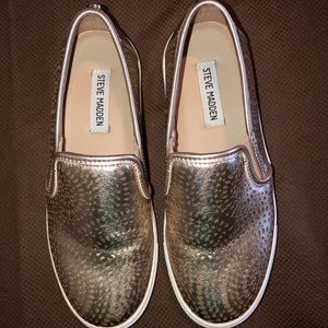 Gold Steve Madden slip on.